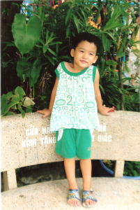 This cutie in green is Phuoc Sang. He was left at the orphanage's door, but is growing into a healthy, energetic boy.